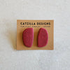 red speckled studs