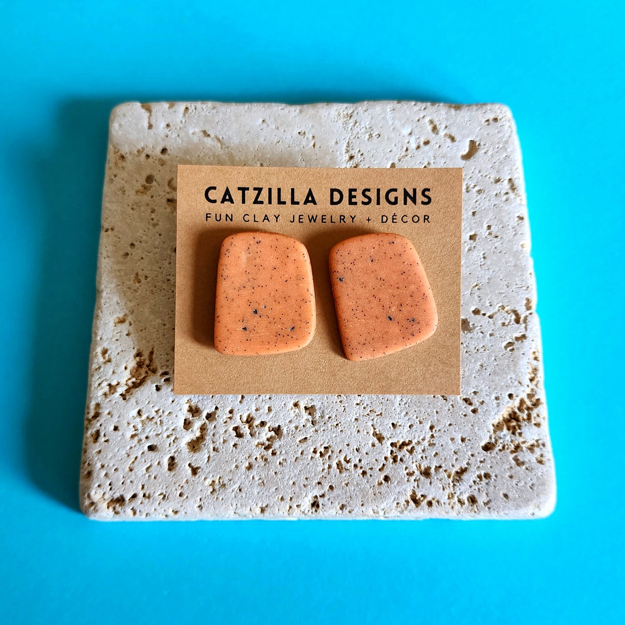 orange speckled studs