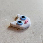 white cat magnet: blue Magnets & Pins