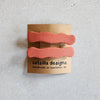wavy burnt orange barrettes