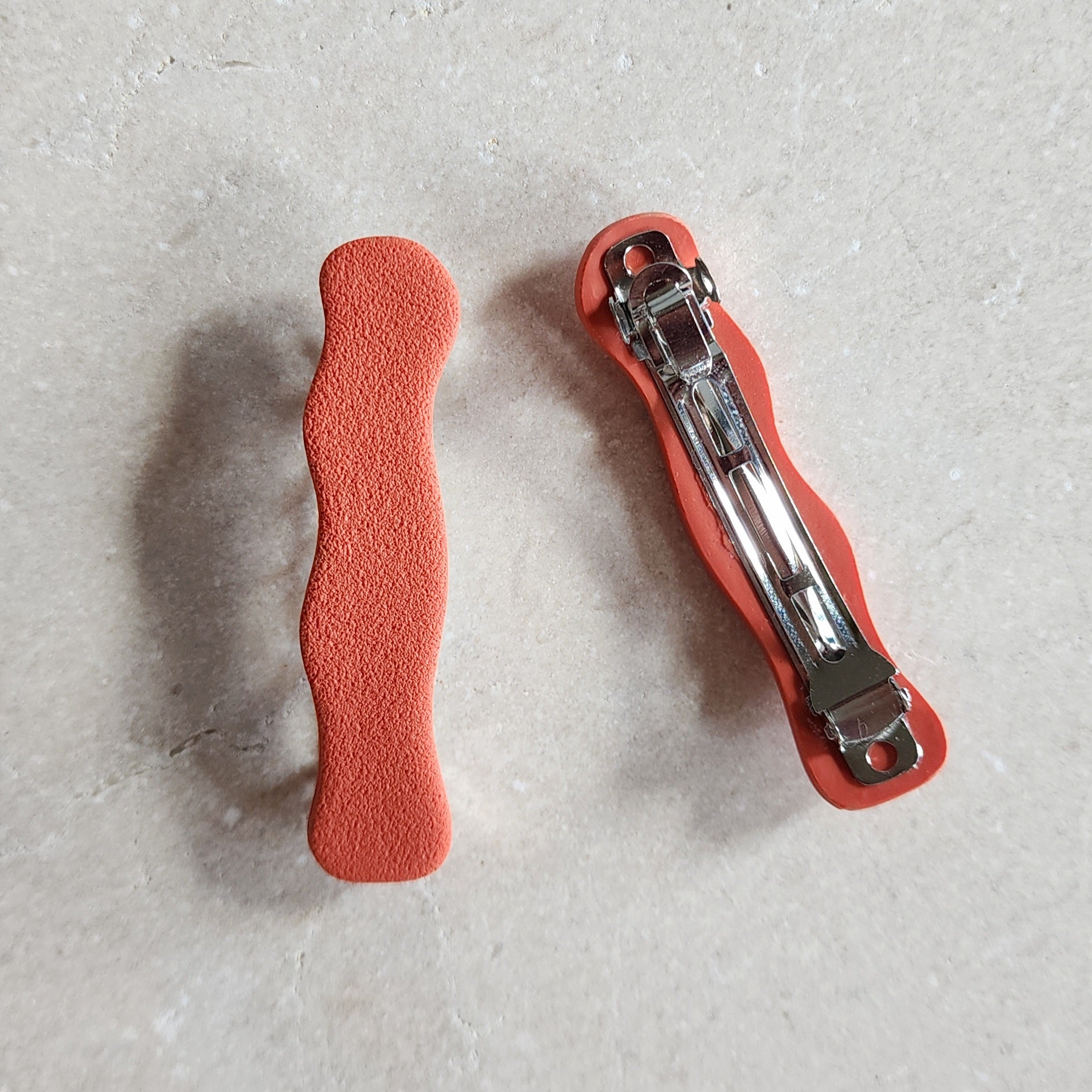 wavy burnt orange barrettes