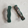 wavy dark green barrettes