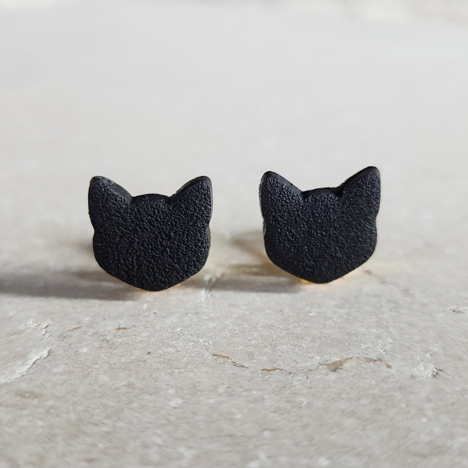 black cat clip-ons