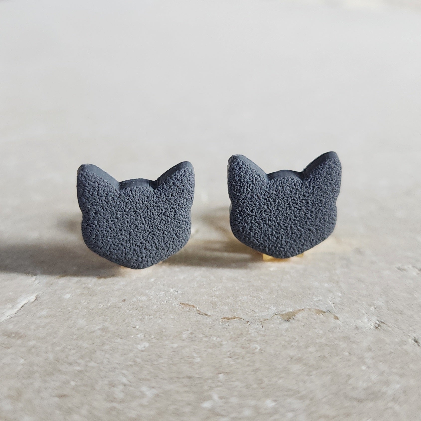 gray cat clip-ons