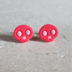 hot pink skull studs