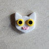 white cat magnet: yellow Magnets & Pins