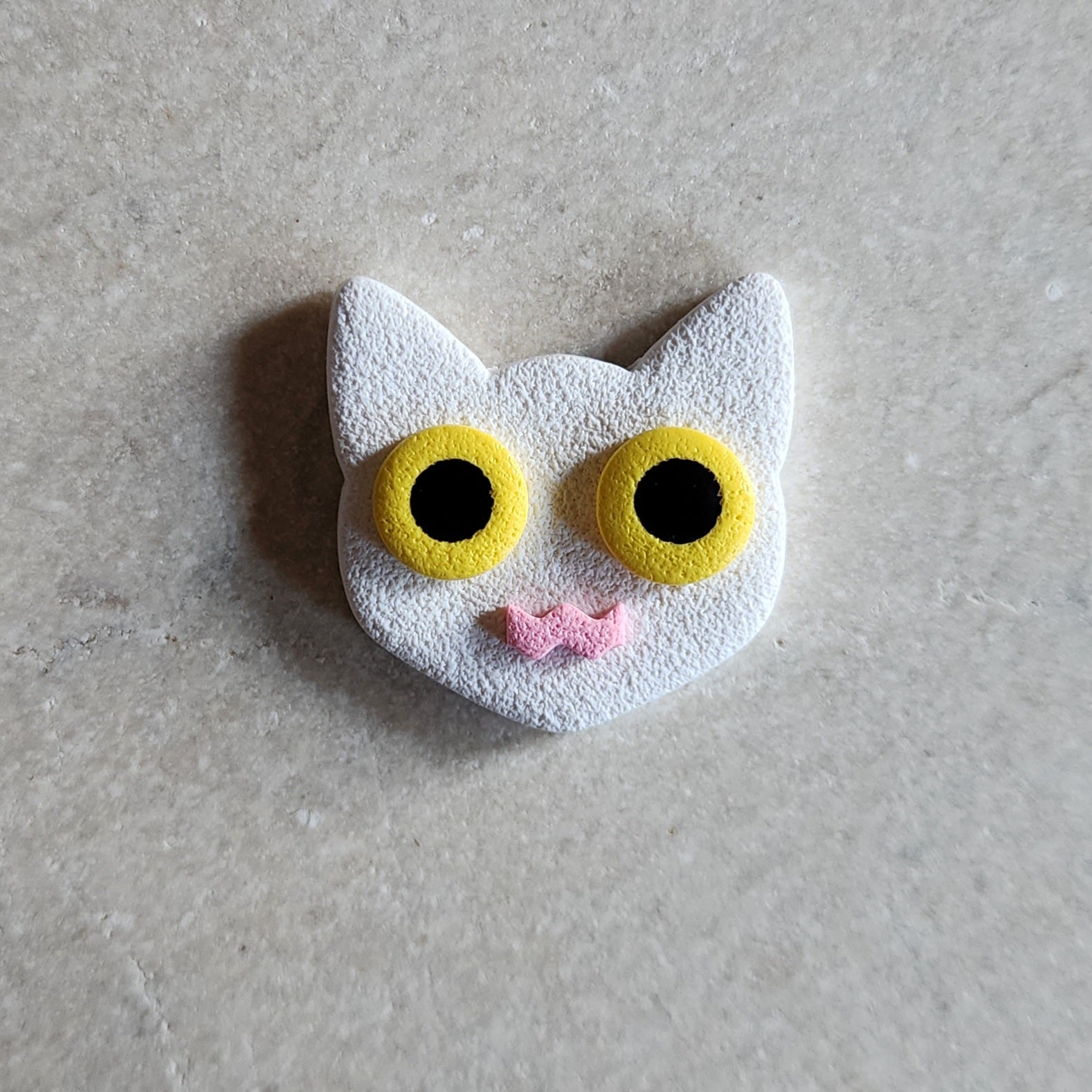 white cat magnet: yellow Magnets & Pins