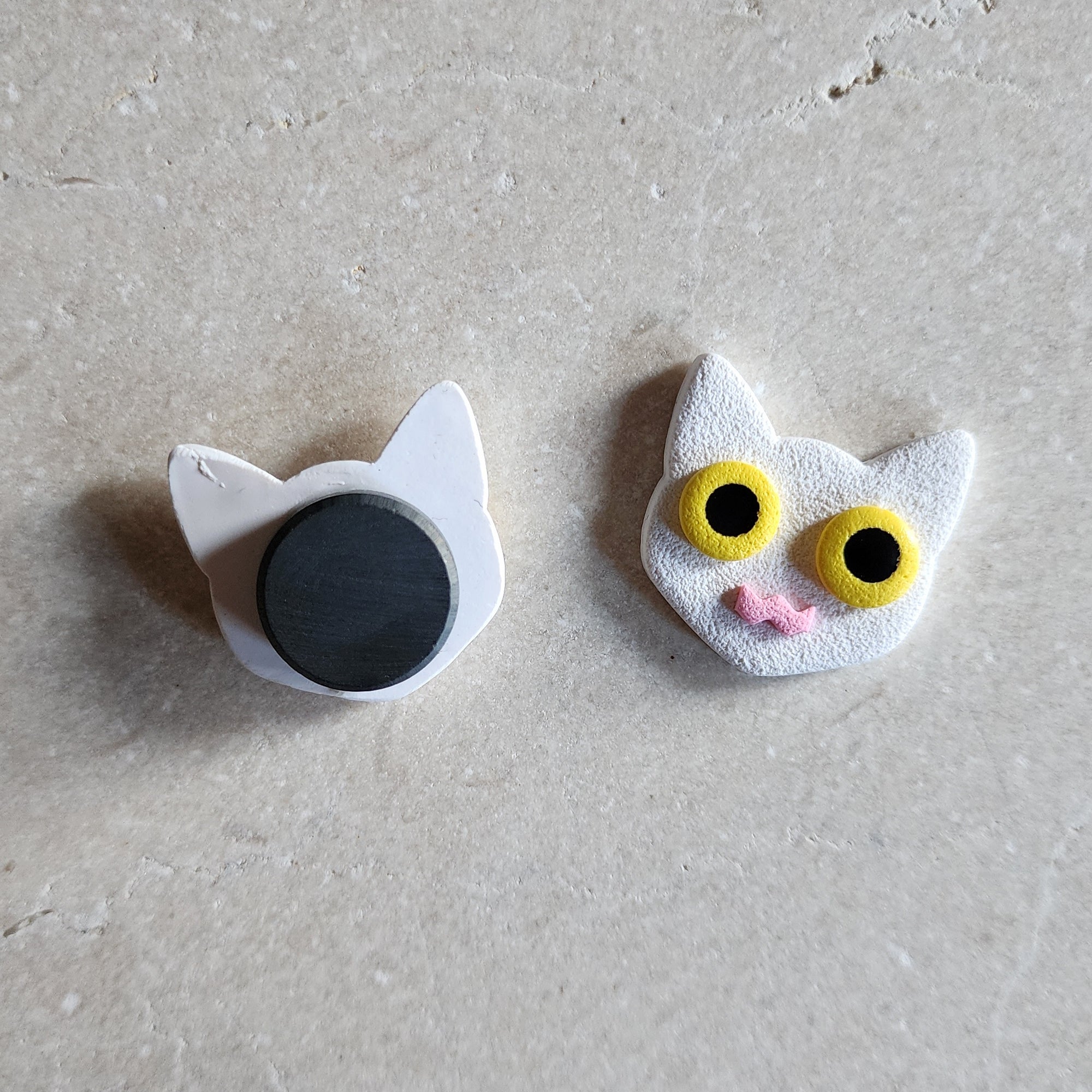 white cat magnet: yellow Magnets & Pins