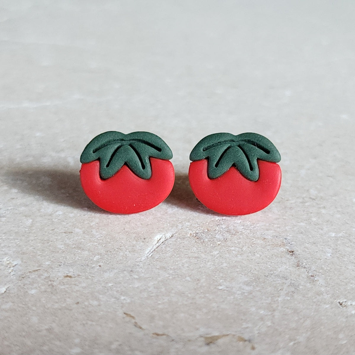red tomato studs